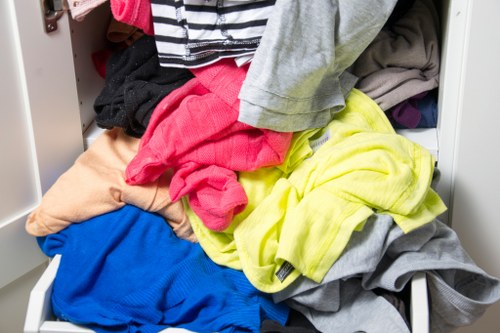 Staff documenting a clearance job with notes